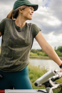 Woman riding her bike after laser treatment